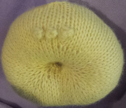 Not loving the off-center bobble placement.