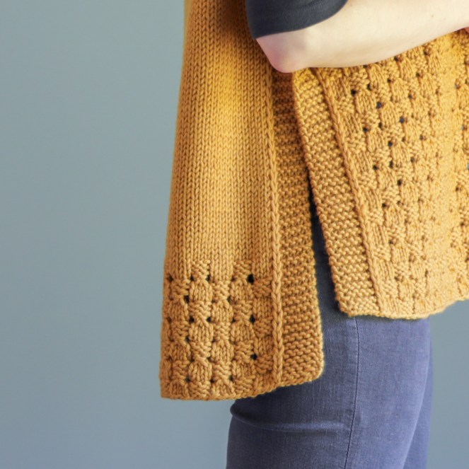 view of side for happy harvest poncho by Elizabeth smith